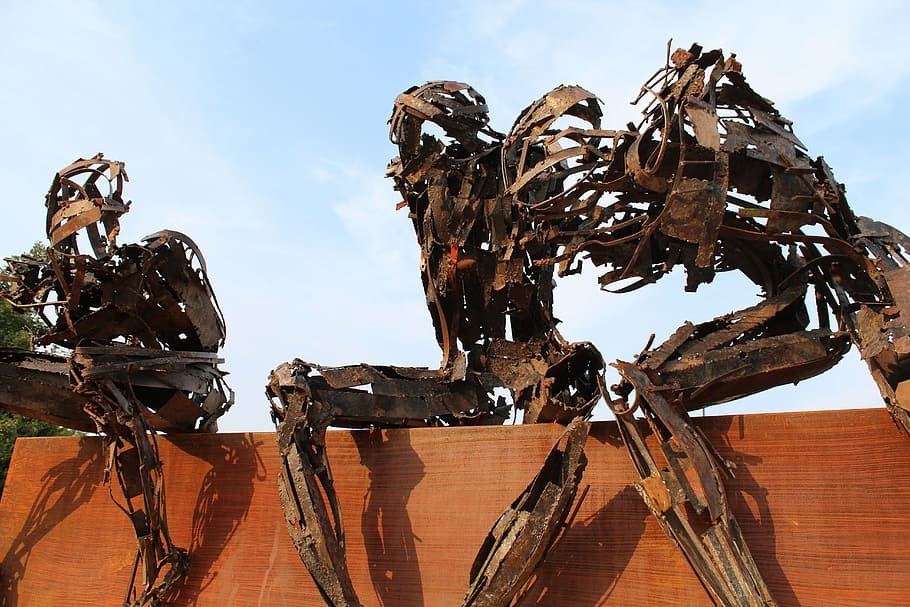 https://www.wallpaperflare.com/three-metal-robots-statues-sitting-on-brown-bench-rusty-robot-wallpaper-zgfkf